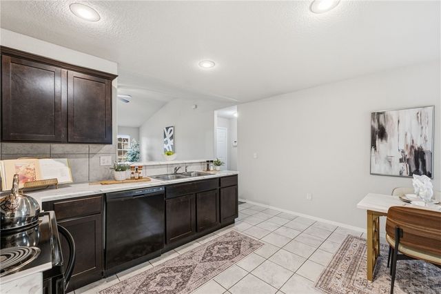 307 Woodcreek Street, Lowell, AR 72745