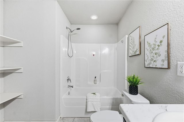 307 Woodcreek Street, Lowell, AR 72745