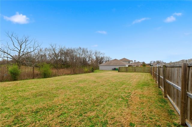 307 Woodcreek Street, Lowell, AR 72745