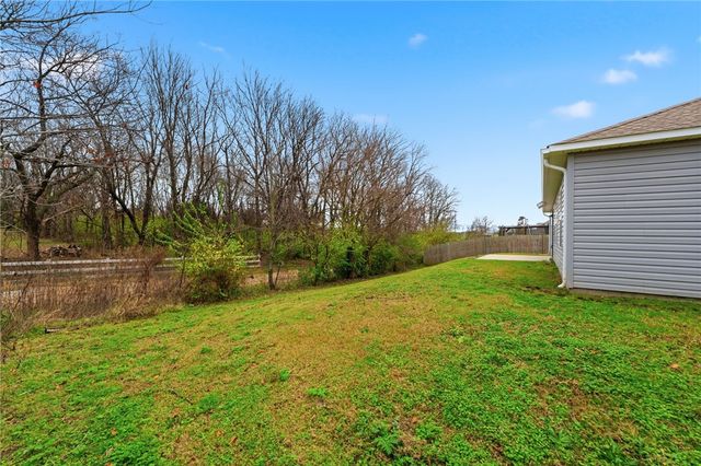 307 Woodcreek Street, Lowell, AR 72745