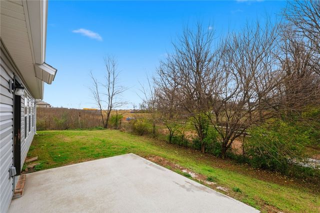 307 Woodcreek Street, Lowell, AR 72745