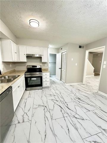 337 Bradley Woods Court NW, Lilburn, GA 30047