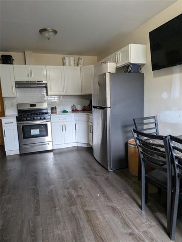 86-15 BRITTON Ave, Elmhurst, NY 11373