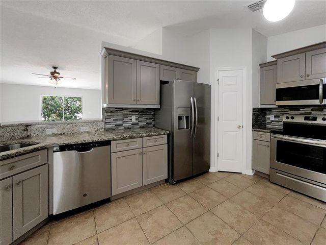 1726 SUNSET RIDGE DRIVE, Mascotte, FL 34753