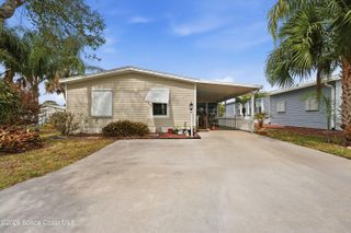 566 Dolphin Circle, Barefoot Bay, FL 32976