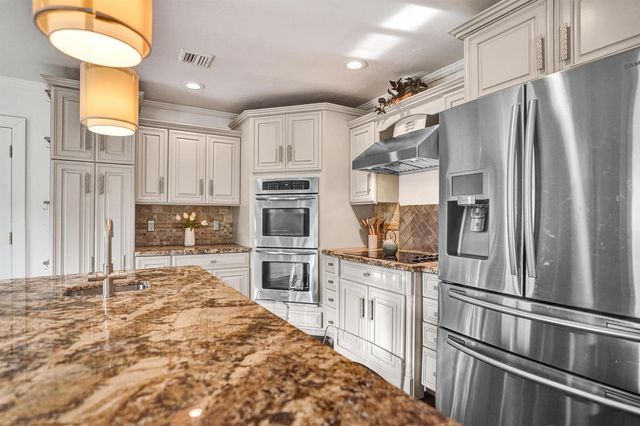 10 Minnetonka Road, Sea Ranch Lakes, FL 33308