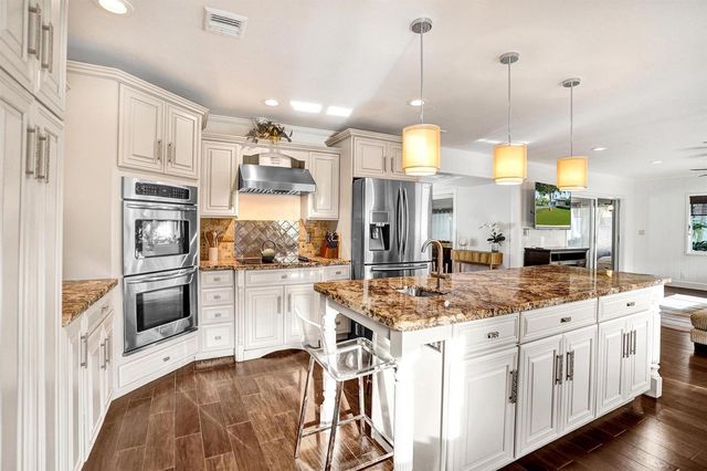 10 Minnetonka Road, Sea Ranch Lakes, FL 33308