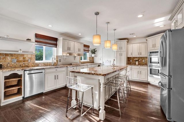 10 Minnetonka Road, Sea Ranch Lakes, FL 33308