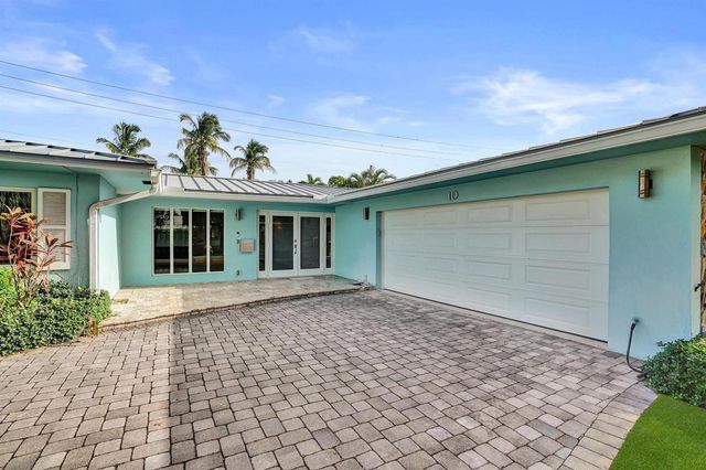 10 Minnetonka Road, Sea Ranch Lakes, FL 33308
