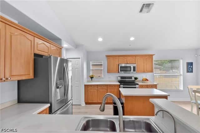 424 La Perouse ST, Lehigh Acres, FL 33974