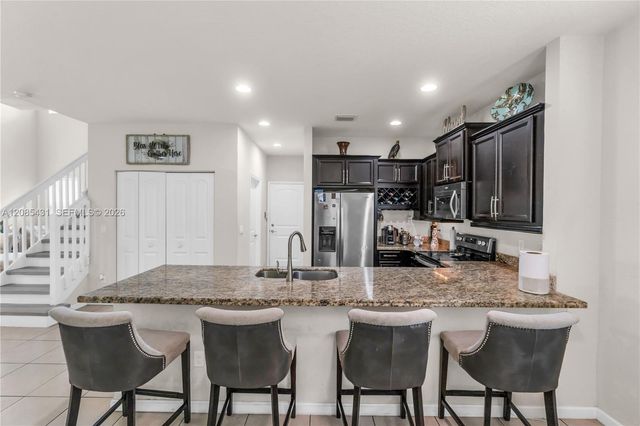 4707 Foxtail Palm Court, Greenacres, FL 33463