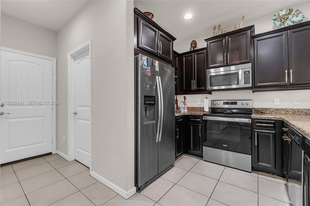 4707 Foxtail Palm Court, Greenacres, FL 33463