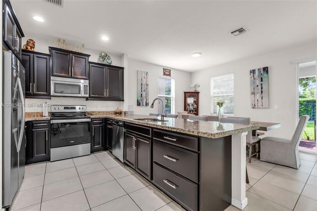 4707 Foxtail Palm Court, Greenacres, FL 33463