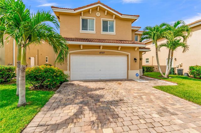 4707 Foxtail Palm Court, Greenacres, FL 33463