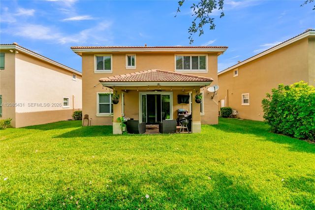4707 Foxtail Palm Court, Greenacres, FL 33463