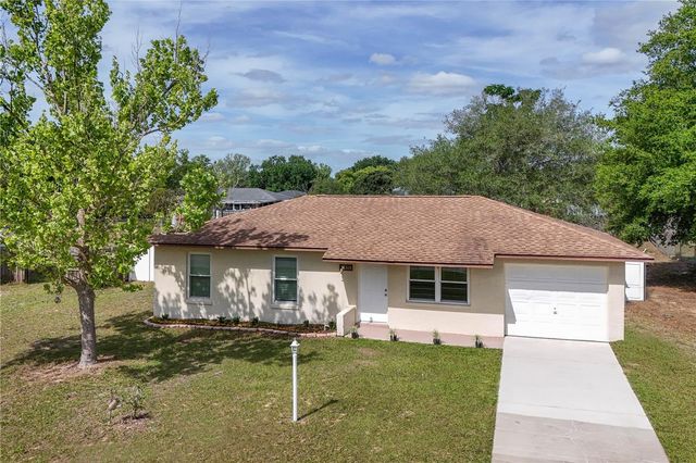 36315 STRATFORD COURT, Grand Island, FL 32735