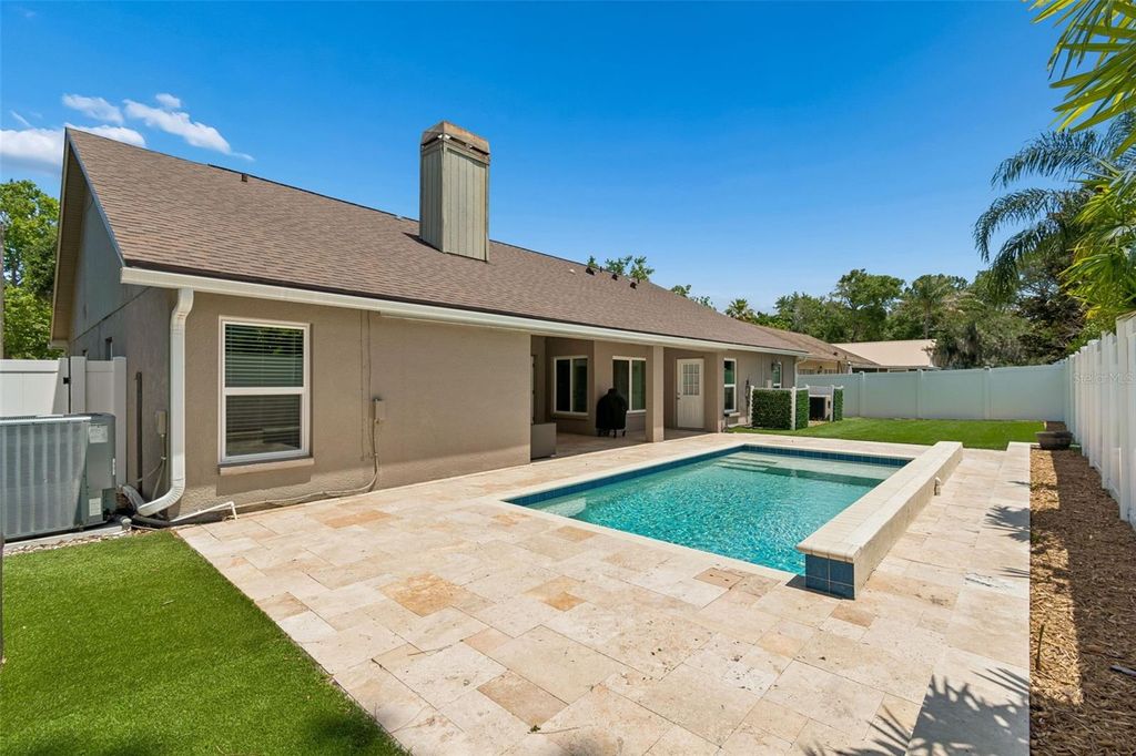 Image 3 of property listing at 9735 CYPRESS POND AVENUE, Tampa, FL 33647