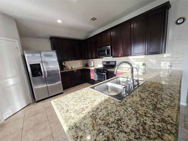 9526 Matilda Creek Court, Richmond, TX 77407