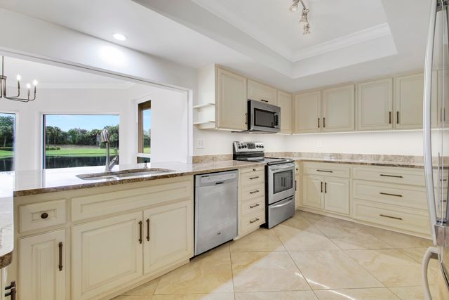 442 FRENCH ROYALE Circle, Atlantis, FL 33462