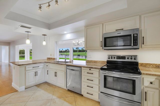 442 FRENCH ROYALE Circle, Atlantis, FL 33462