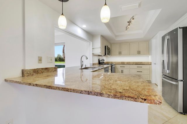 442 FRENCH ROYALE Circle, Atlantis, FL 33462