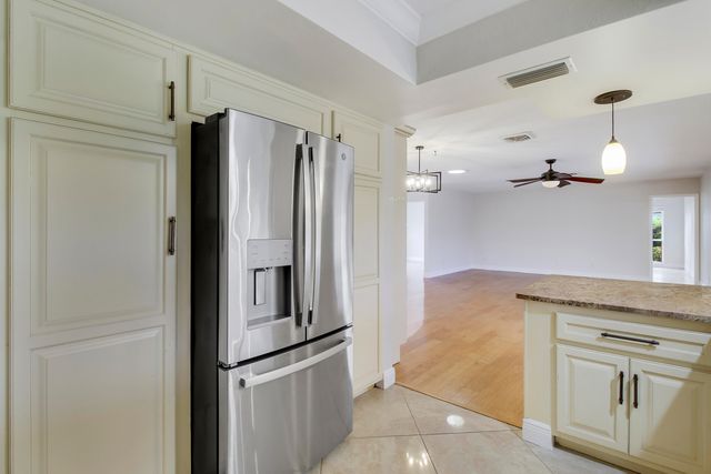 442 FRENCH ROYALE Circle, Atlantis, FL 33462