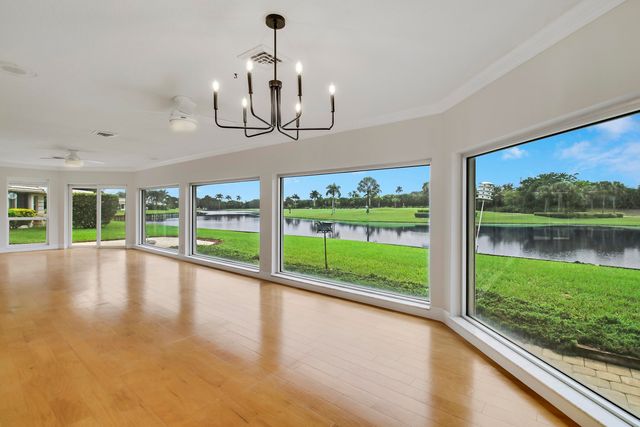442 FRENCH ROYALE Circle, Atlantis, FL 33462