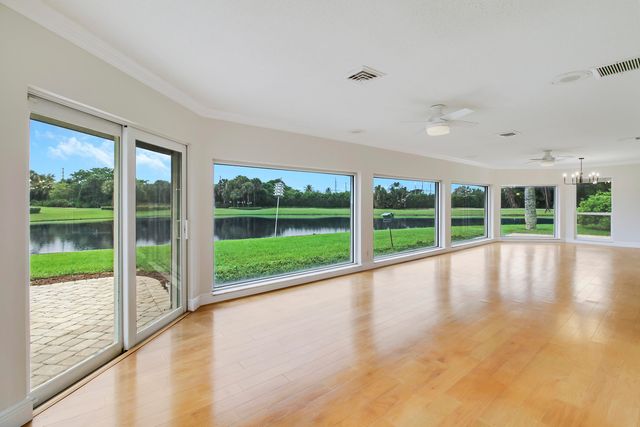 442 FRENCH ROYALE Circle, Atlantis, FL 33462