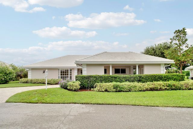 442 FRENCH ROYALE Circle, Atlantis, FL 33462