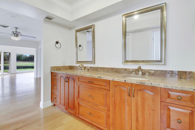 442 FRENCH ROYALE Circle, Atlantis, FL 33462