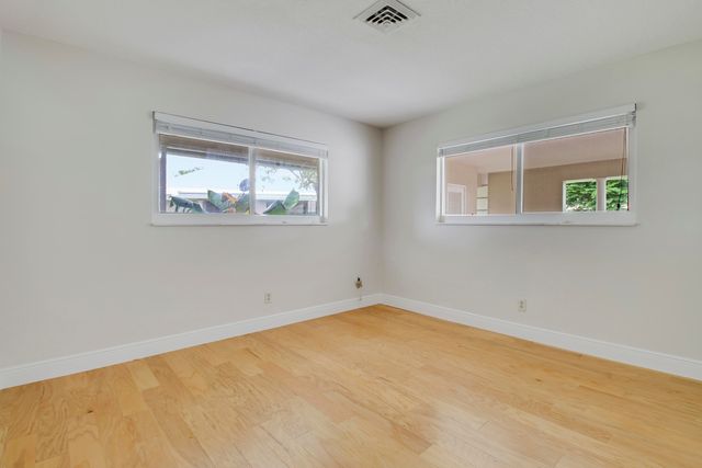 442 FRENCH ROYALE Circle, Atlantis, FL 33462