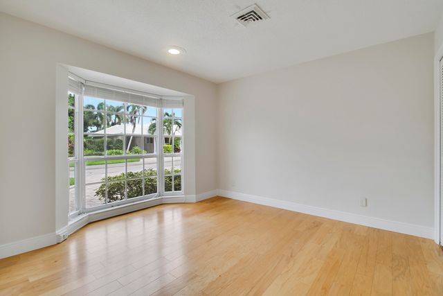 442 FRENCH ROYALE Circle, Atlantis, FL 33462