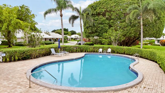 442 FRENCH ROYALE Circle, Atlantis, FL 33462