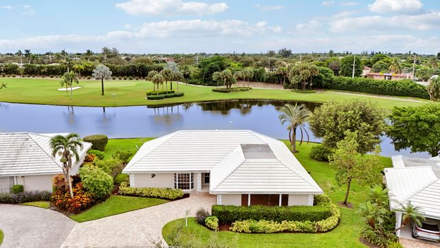 442 FRENCH ROYALE Circle, Atlantis, FL 33462