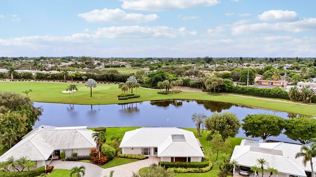 442 FRENCH ROYALE Circle, Atlantis, FL 33462