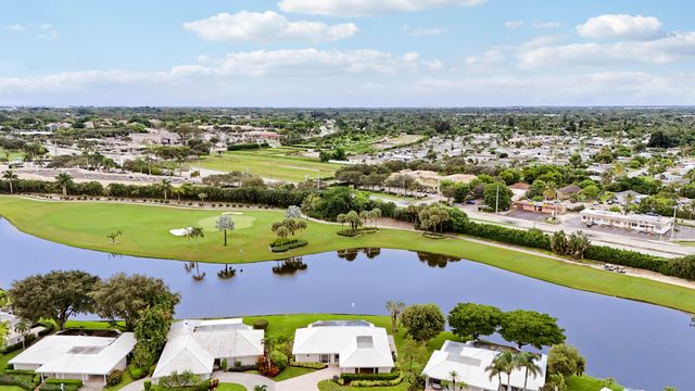 442 FRENCH ROYALE Circle, Atlantis, FL 33462