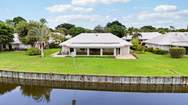 442 FRENCH ROYALE Circle, Atlantis, FL 33462
