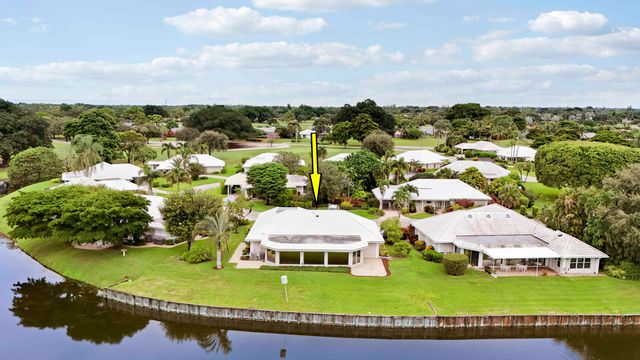 442 FRENCH ROYALE Circle, Atlantis, FL 33462