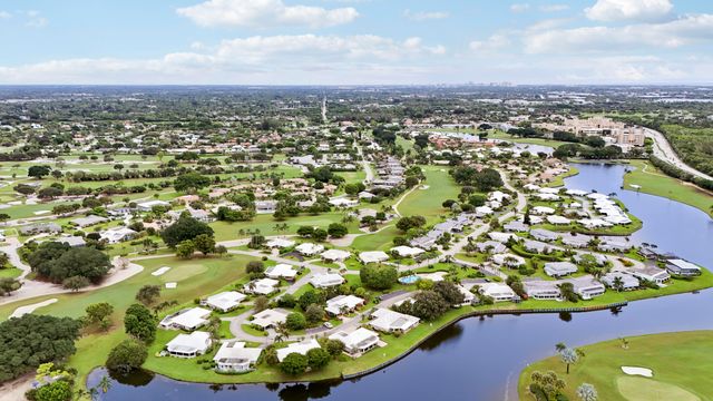 442 FRENCH ROYALE Circle, Atlantis, FL 33462