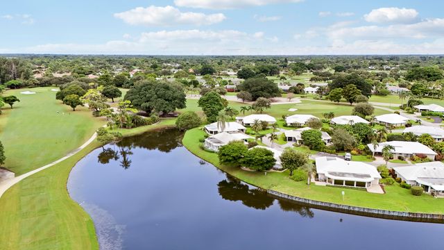 442 FRENCH ROYALE Circle, Atlantis, FL 33462