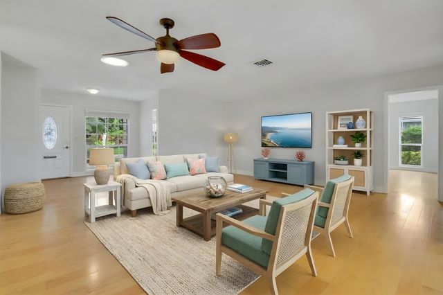 442 FRENCH ROYALE Circle, Atlantis, FL 33462