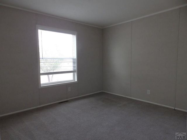1038 S Saddlerock Dr, Pueblo West, CO 81007