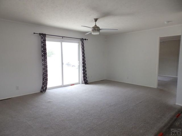 1038 S Saddlerock Dr, Pueblo West, CO 81007