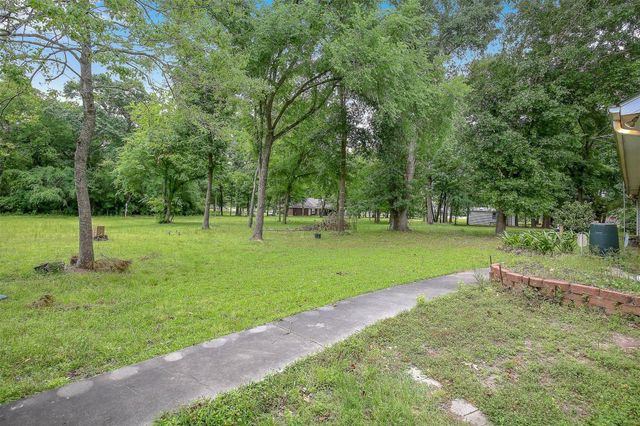13825 Midway Drive, Willis, TX 77318