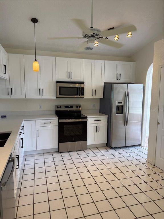 Image 3 of property listing at 12613 SUMMER TREE COURT, Orlando, FL 32828