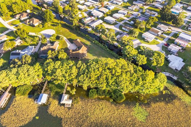12131 EAGLES POINT COURT, Grand Island, FL 32735