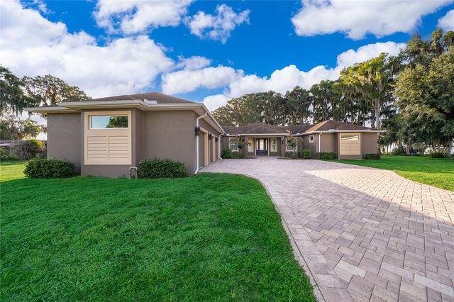 12131 EAGLES POINT COURT, Grand Island, FL 32735