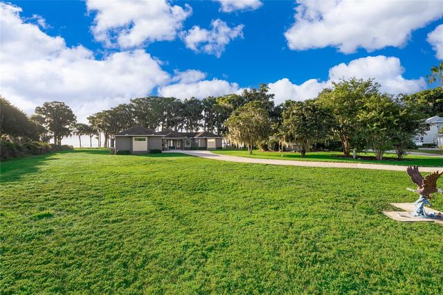 12131 EAGLES POINT COURT, Grand Island, FL 32735