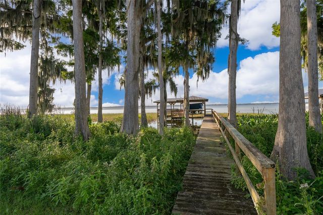 12131 EAGLES POINT COURT, Grand Island, FL 32735