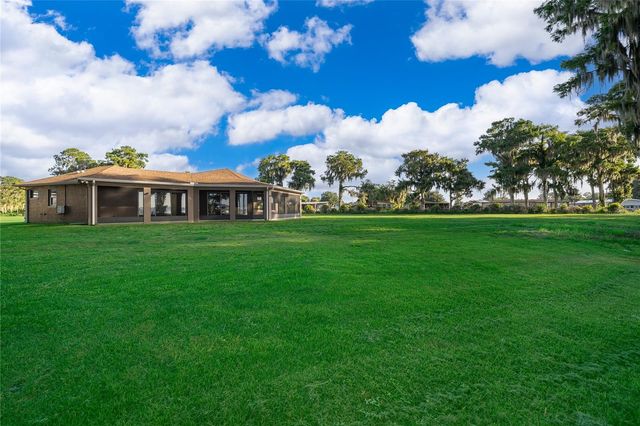 12131 EAGLES POINT COURT, Grand Island, FL 32735